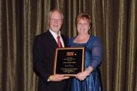 Chief of Operations Lori Campbell receives the Singer Award