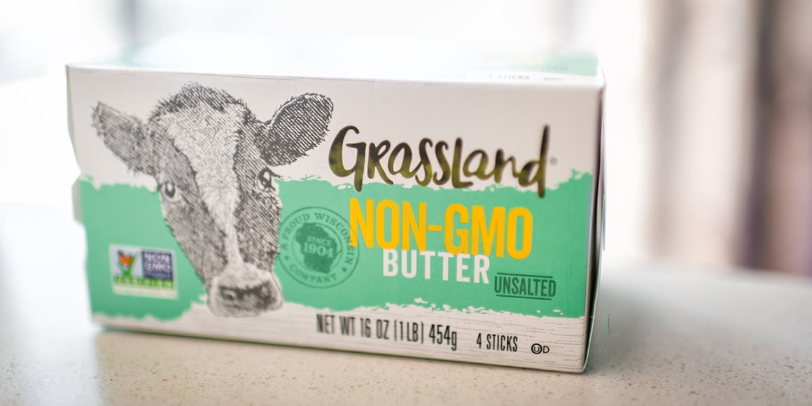 Grassland Non-GMO butter packaging displaying food label certification requirements including the Non-GMO Project Verified symbol